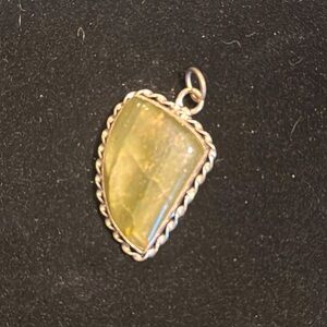 Silver and green stone pendant